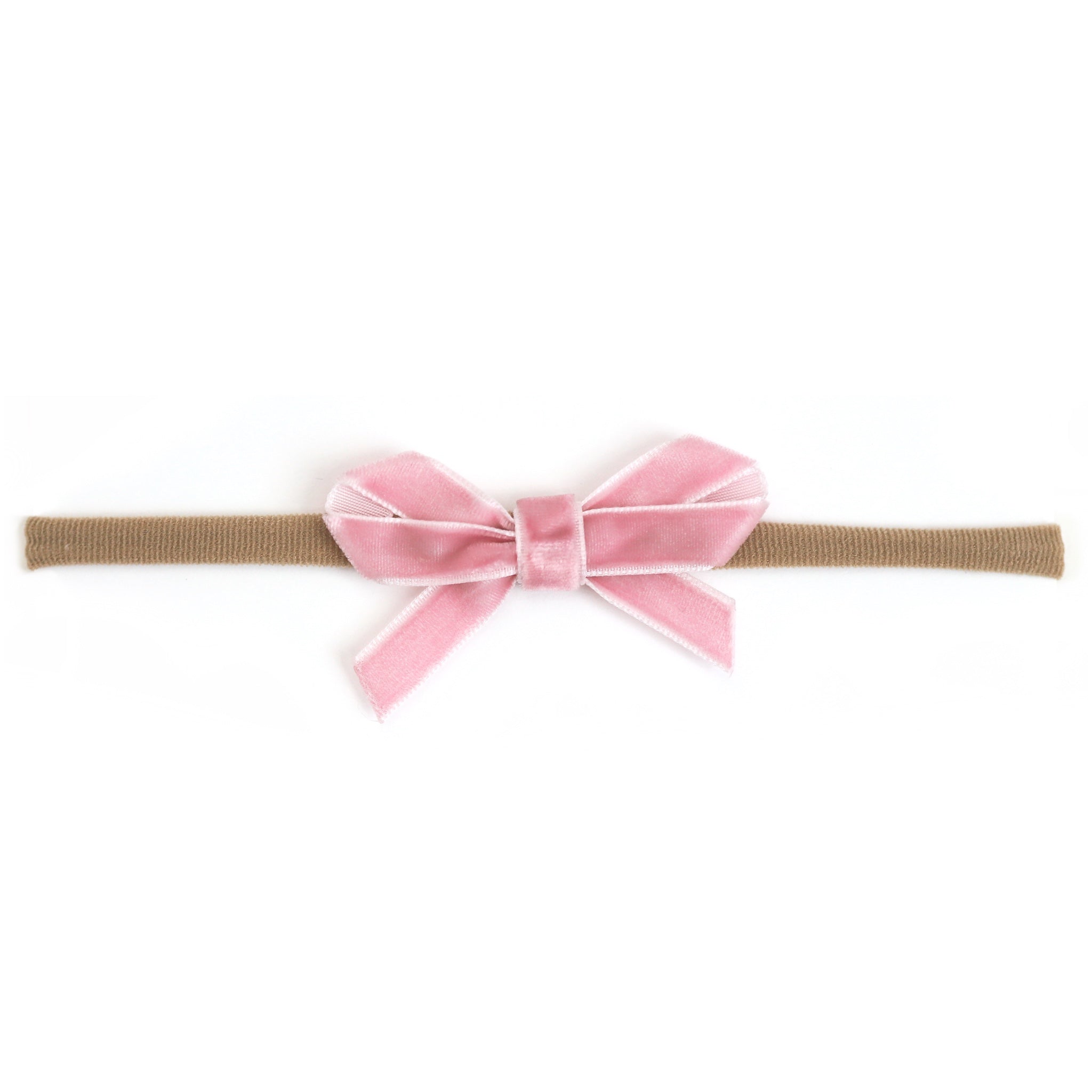 baby girl's light pink velvet ribbon bow on stretchy nylon headband for spring and easter