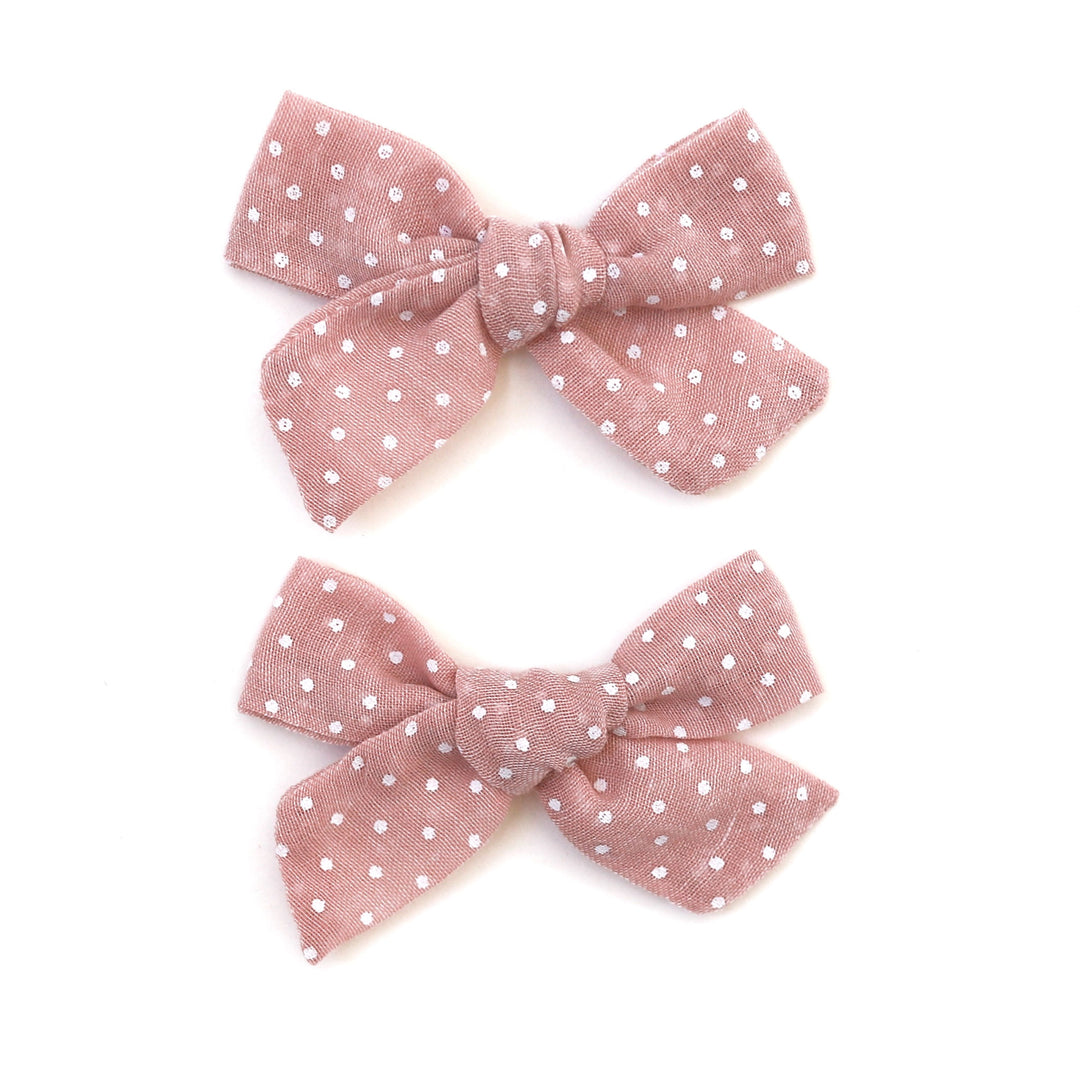 pigtail bows in blush pink with tiny white dots