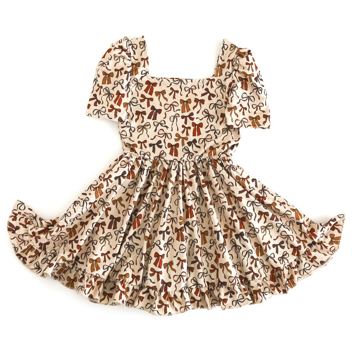girls' short sleeve cream twirl dress with bow print in fall shades