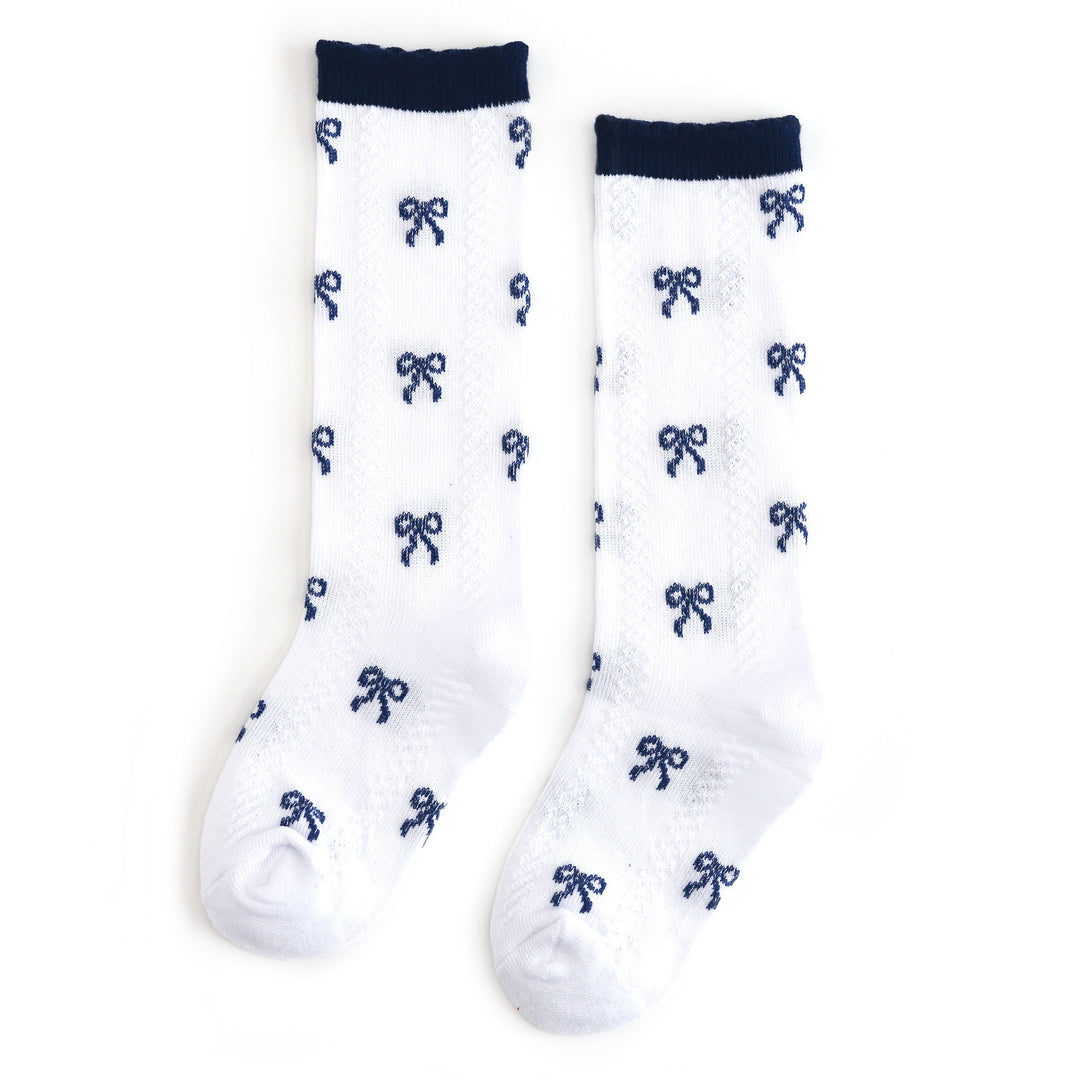 girls white knee high socks with navy bows and navy scalloped trim