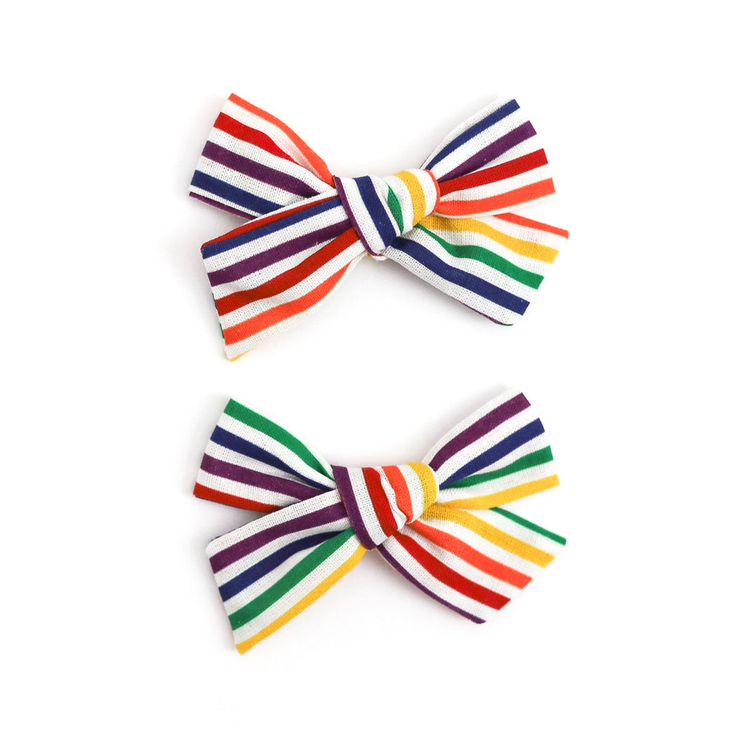 pair of rainbow stripe pigtail bows