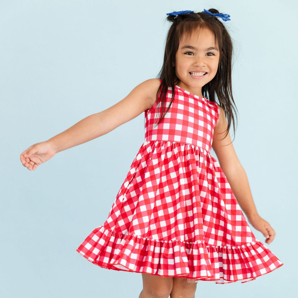 little girl in red and white picnic plaid summer tank top twirl dress