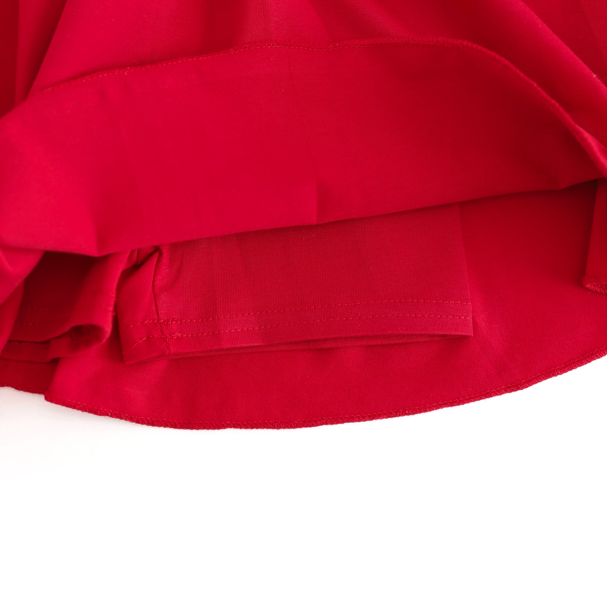 closeup of attached stretchy shorts for red cotton blend girlhood skort
