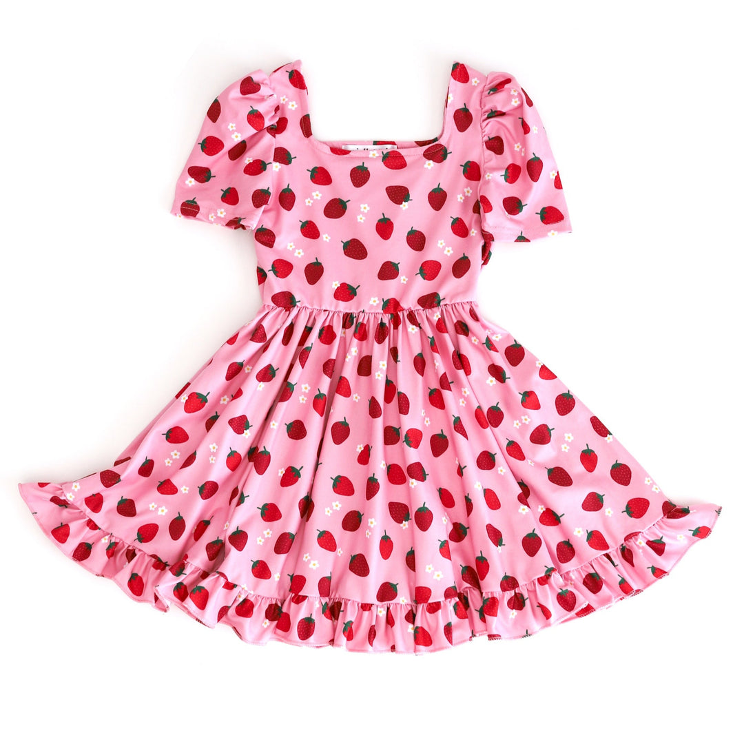 girls' pink short sleeve twirl dress with red strawberry print and dainty white flowers