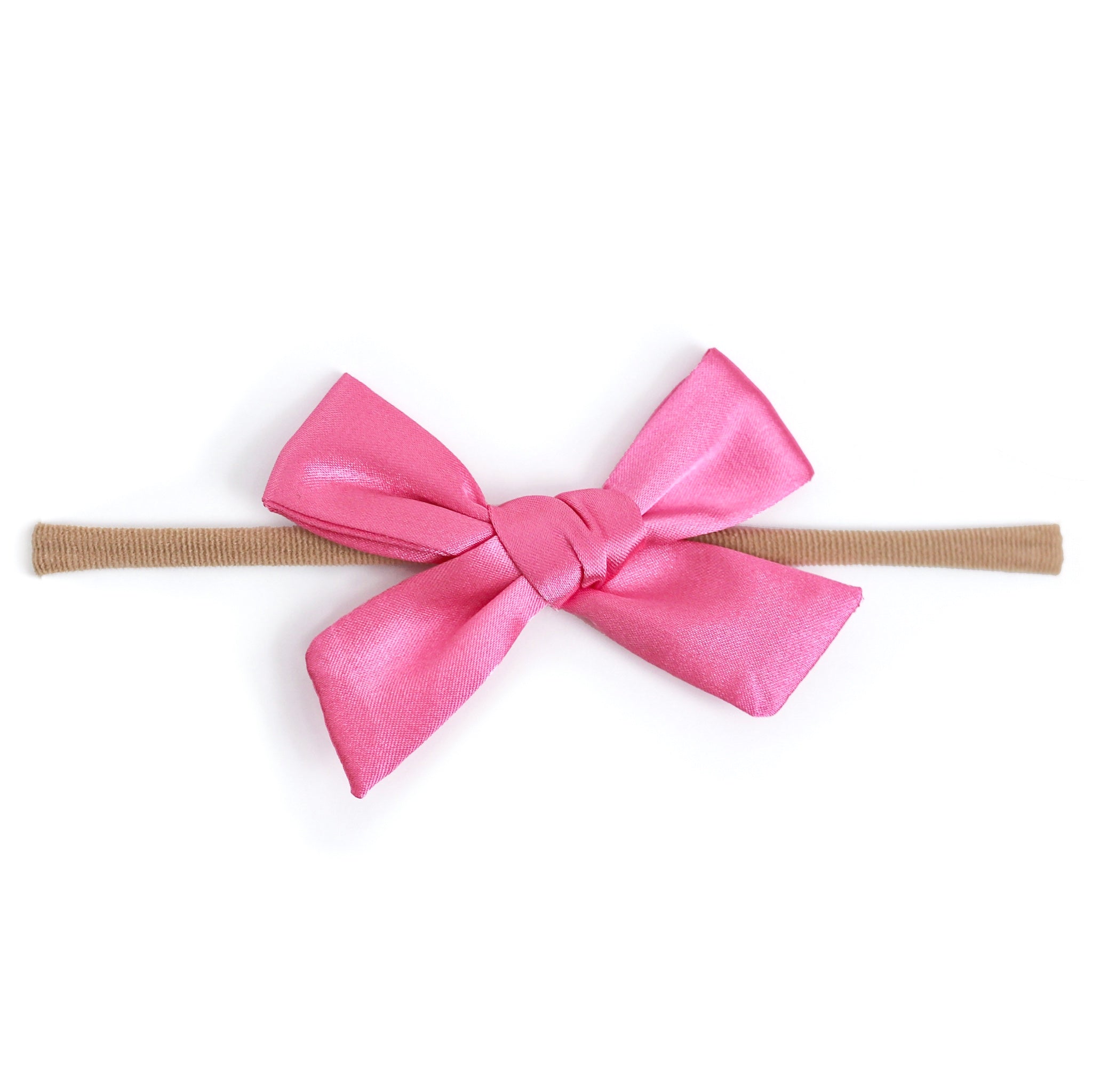 pink satin bow on soft nylon band for baby girl
