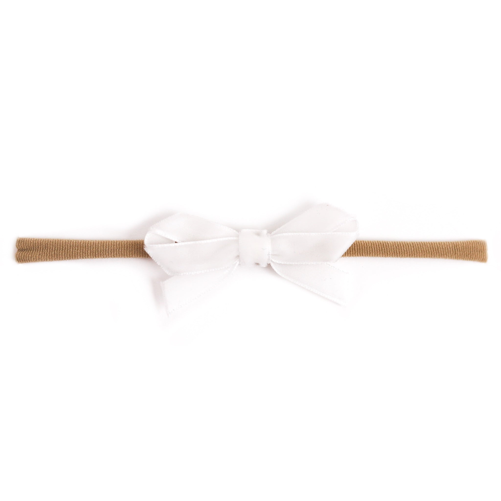 baby girl's white velvet ribbon bow on stretchy nylon headband for spring and easter