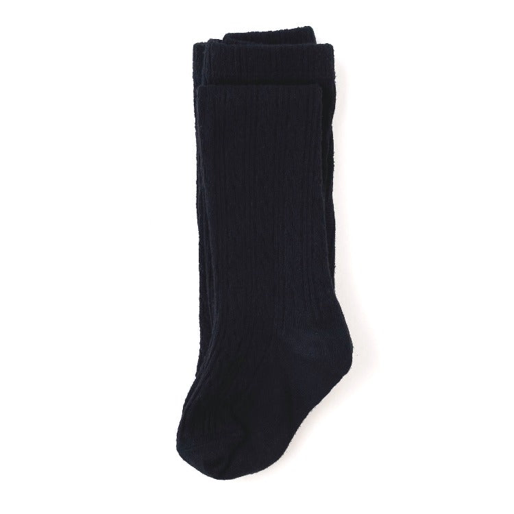 Black cable knit tights for babies, toddlers and little girls made by little stocking co.