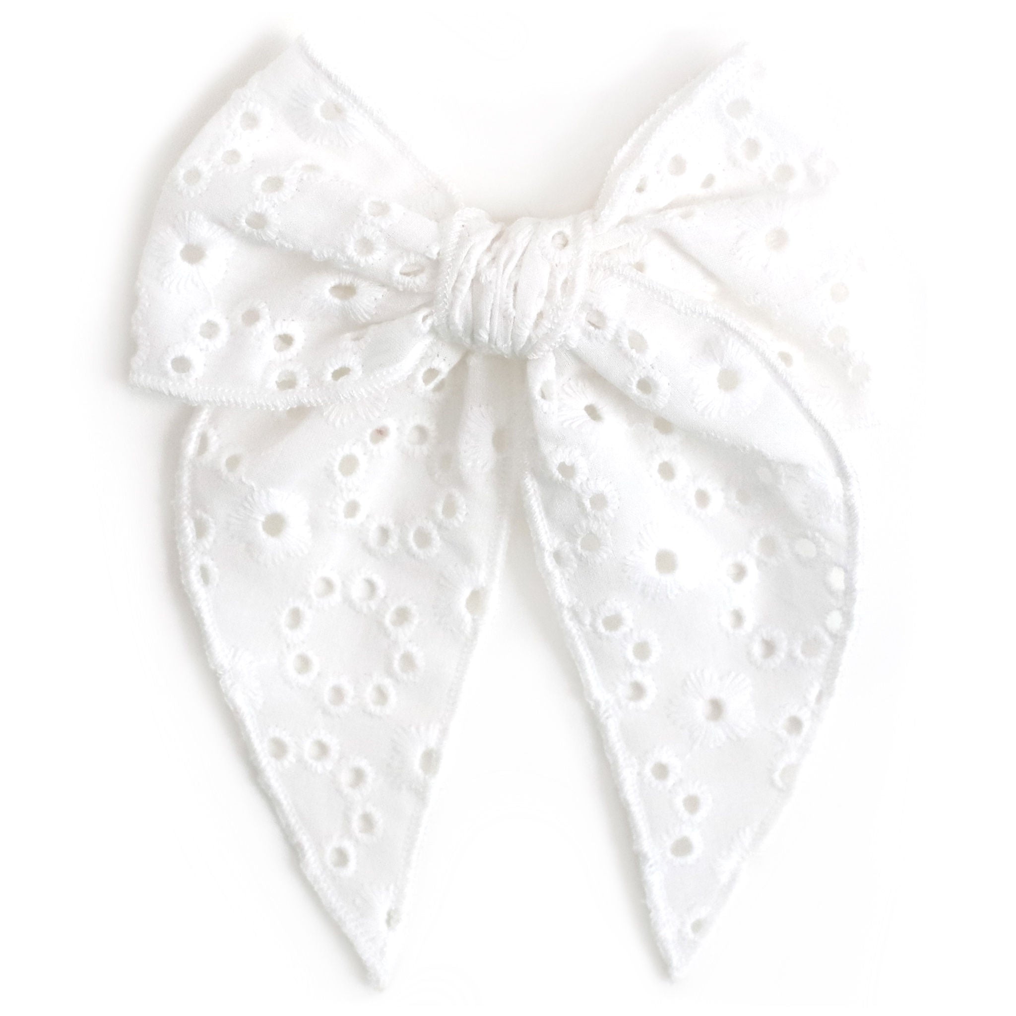 girls hair bow in white eyelet fabric