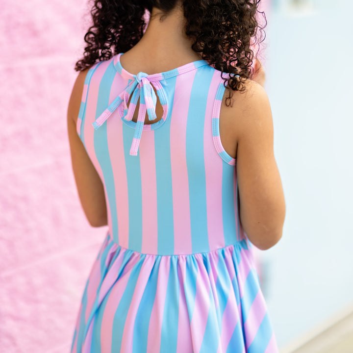 back detail of blue and pink vertical striped twirl dress