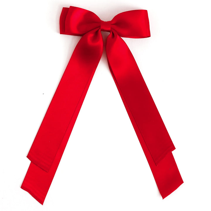 girl's red satin ribbon bow with long tails