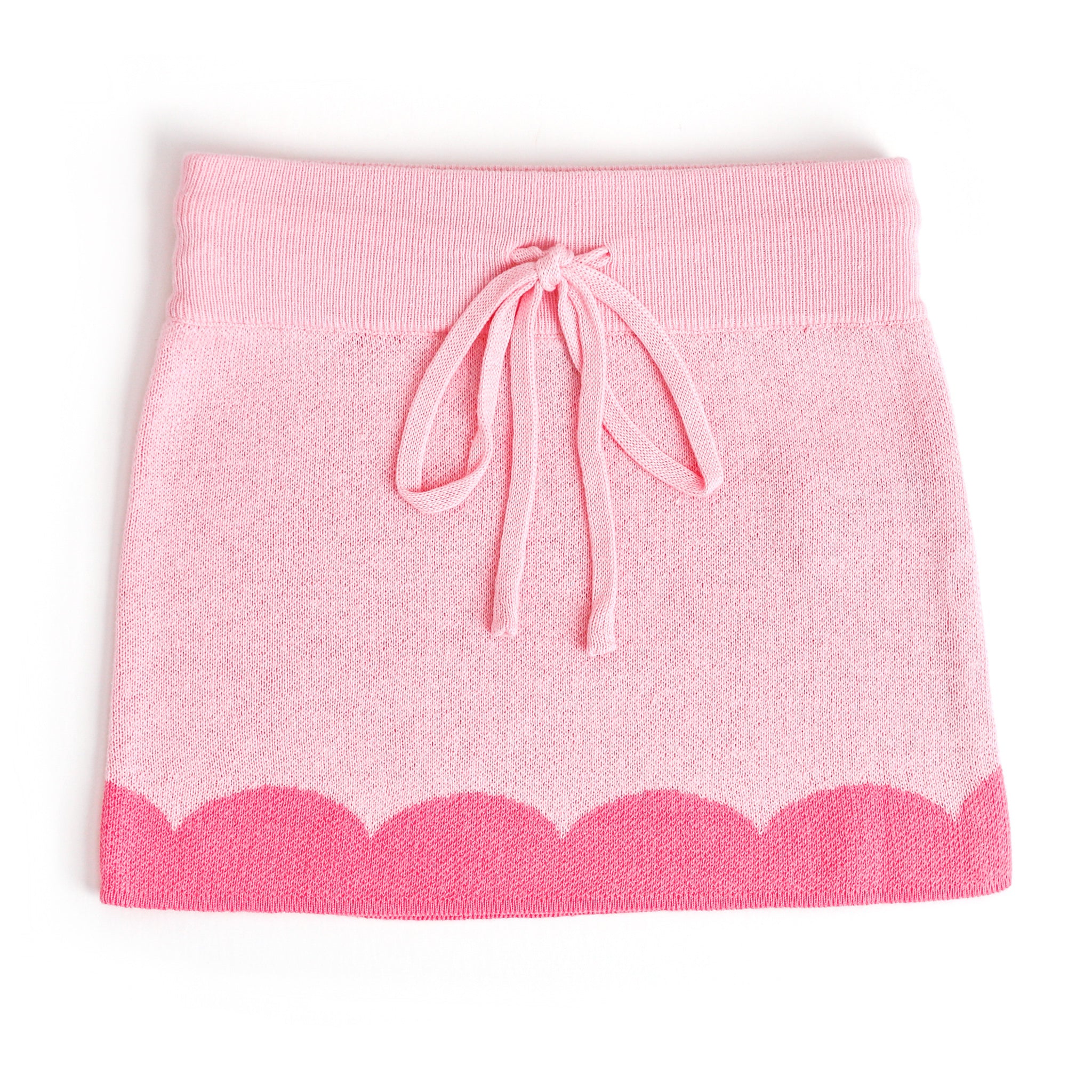 girl's pastel pink cotton knit sweater skirt with taffy pink scallop print trim and functional drawstring waistband