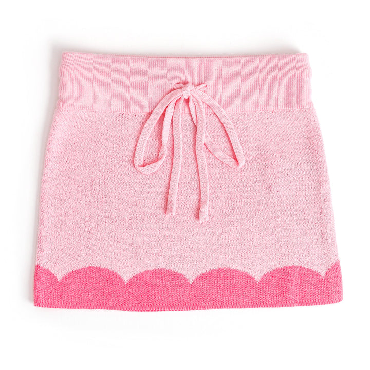 girl's pastel pink cotton knit sweater skirt with taffy pink scallop print trim and functional drawstring waistband