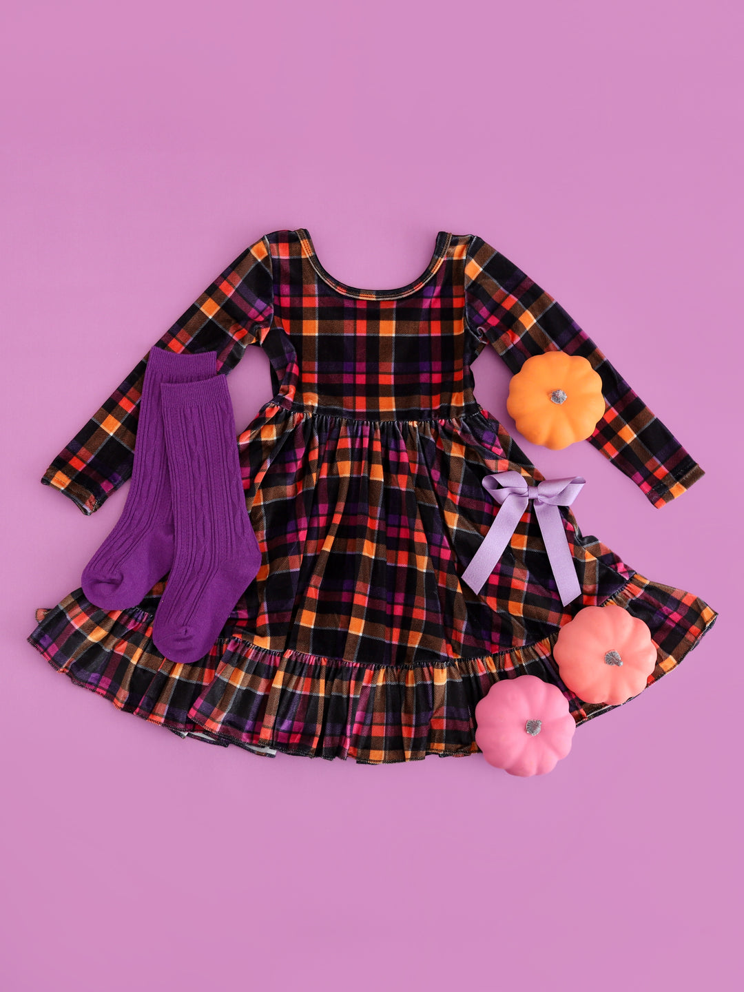 girls' long sleeve plaid velvet dress in Halloween shades, purple cable knit knee high socks and light purple sparkly bow