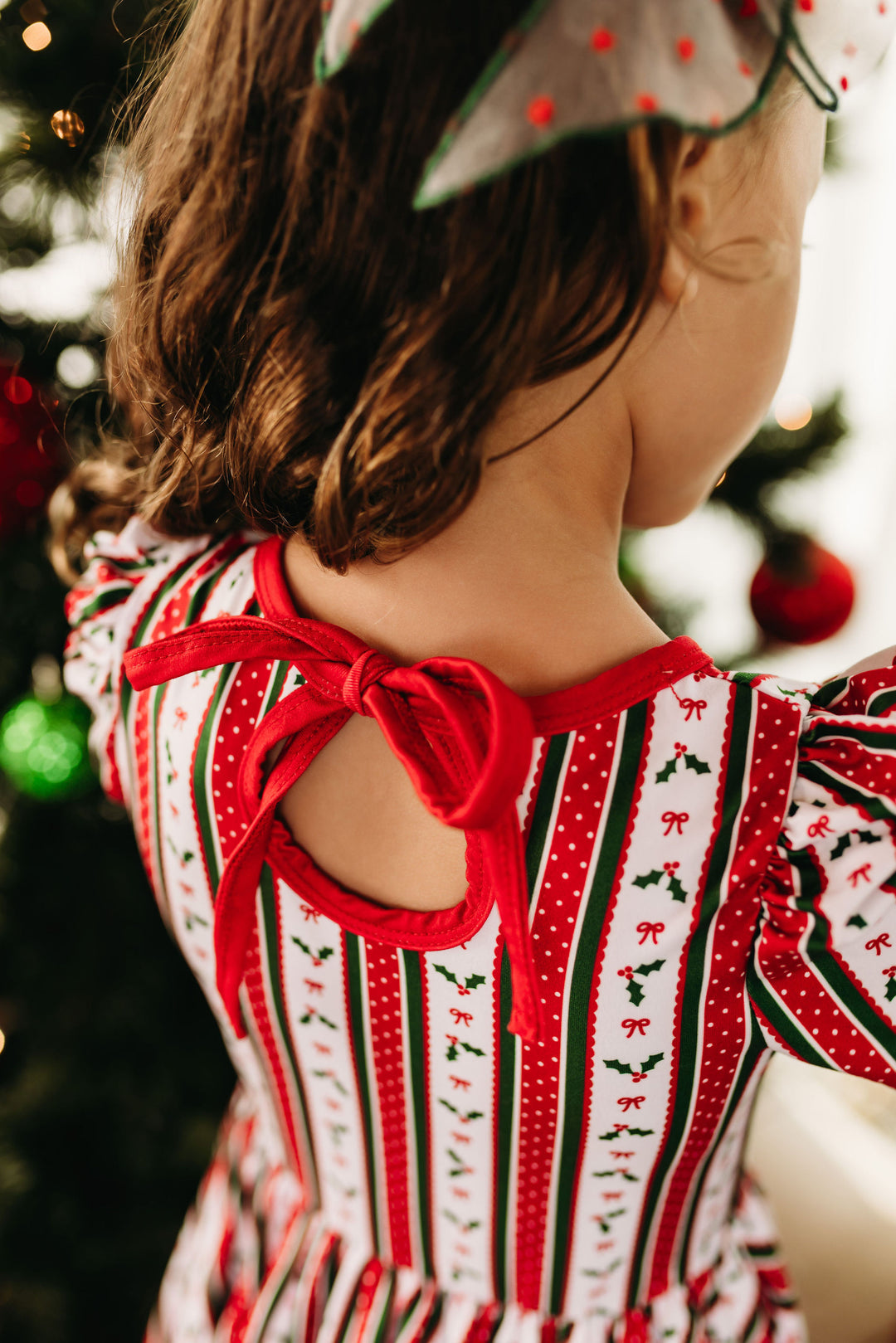details of little girls holly wallpaper christmas twirl dress