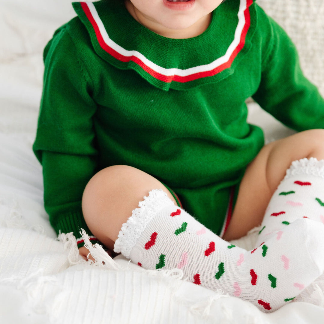 christmas hearts knee high socks on baby girl