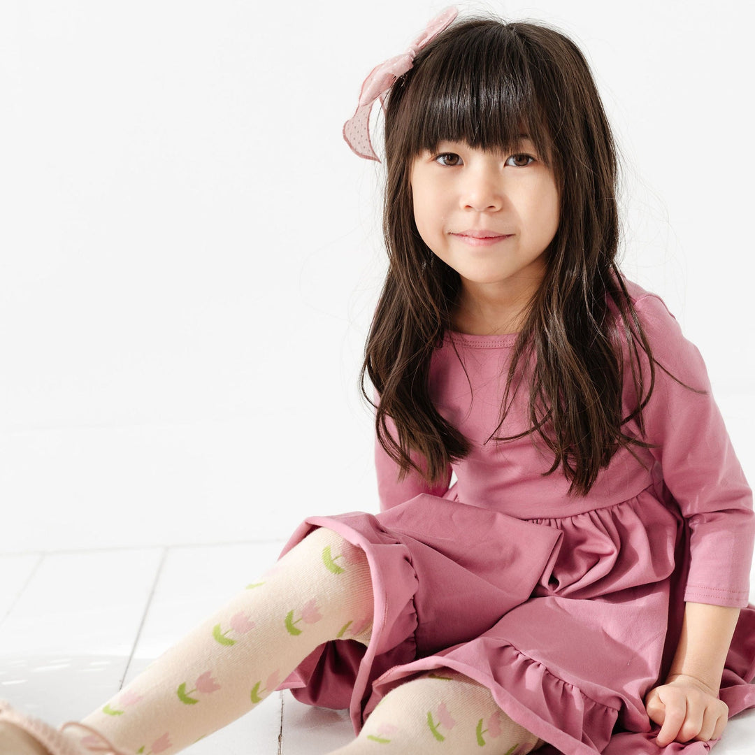 girls mauve rose twirl dress with tulip tights for spring