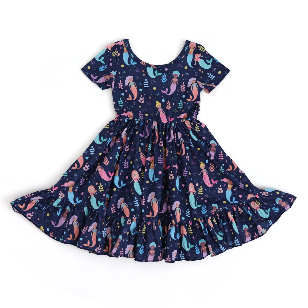 girls navy mermaid print twirl dress on white background