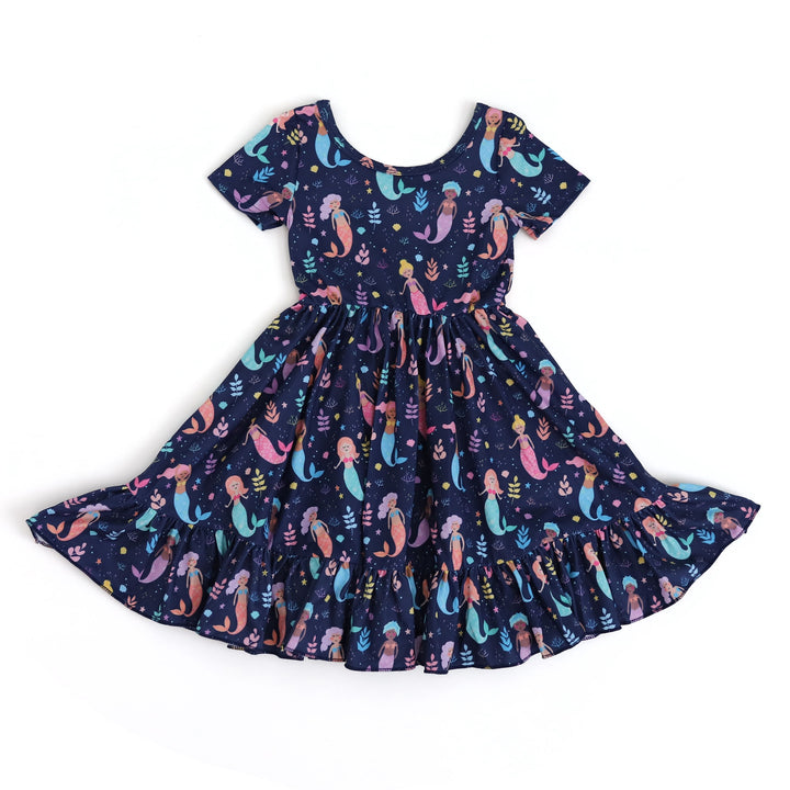 girls navy mermaid print twirl dress on white background