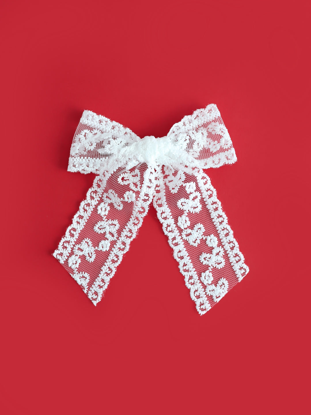 dainty white lace hair bow on silver alligator clip