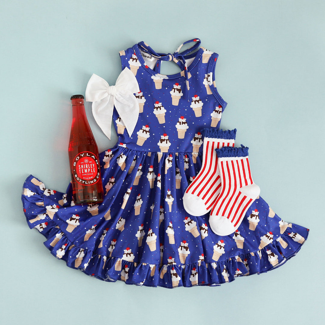 Patriotic ice cream cone print dress outfir with white bow and red, white and blue striped lace socks