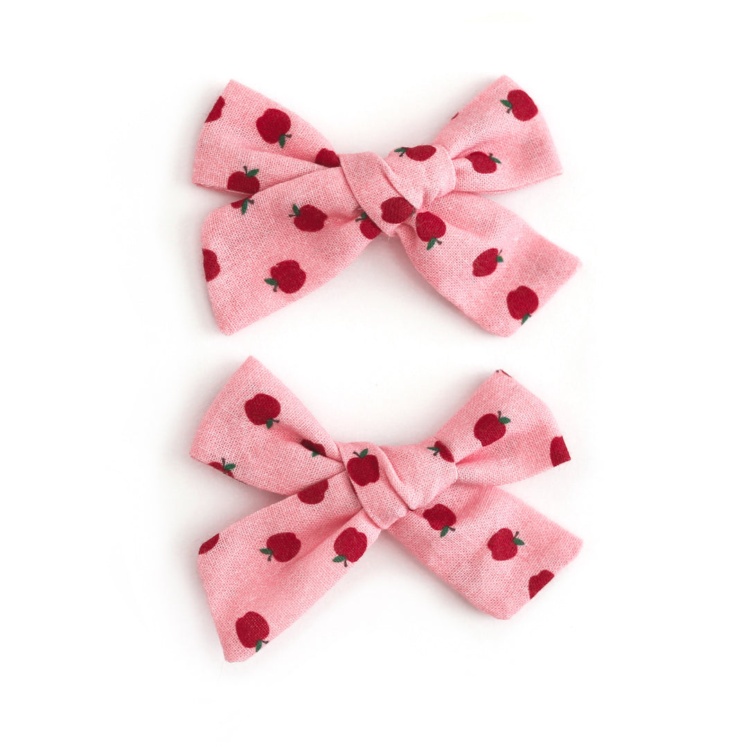 girls pink pigtail bows on clips with apple print for fall apple picking and school days