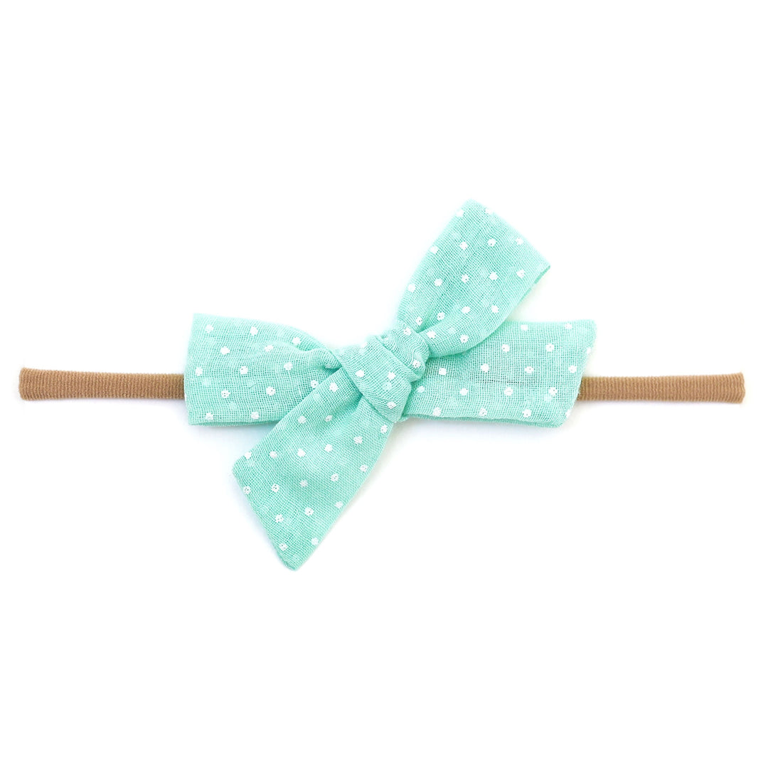 aqua blue and white dot baby hair bow on nylon band