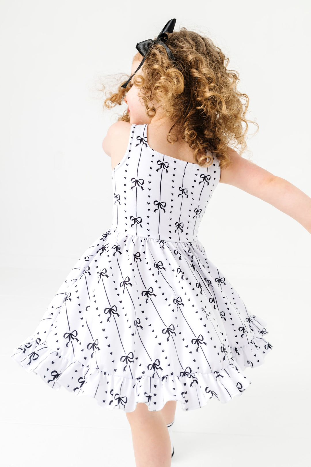 Girls' monochrome bow print sleeveless summer twirl dress 5 Girls' monochrome bow print sleeveless summer twirl dress 5