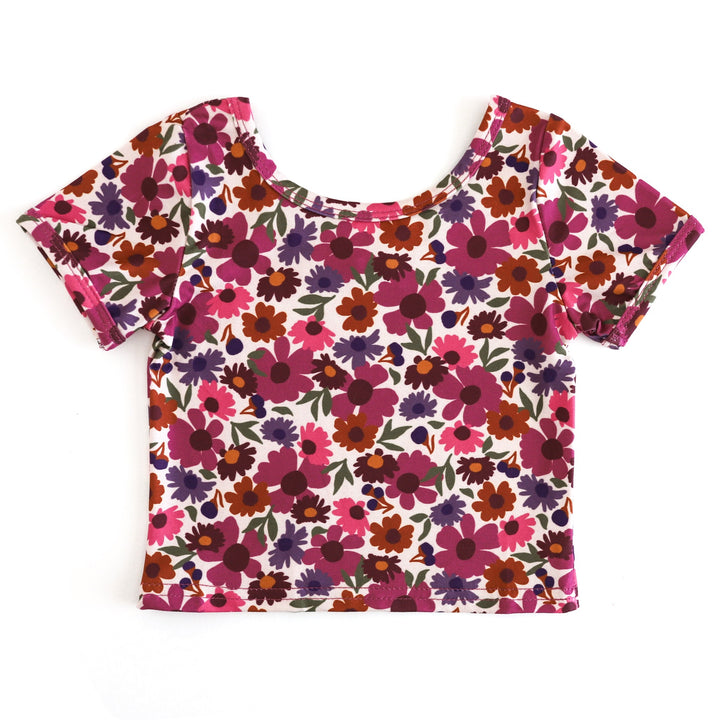 girls printed t-shirt with fall pinks, burgundy, mustard and sugar almond color palette on light cream background 