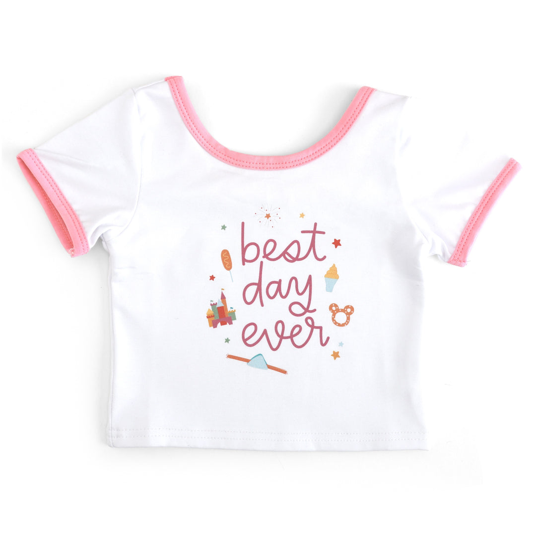 girl's fitted white tee with pink binding on the sleeve and neck and "best day ever" print for magical parks collection
