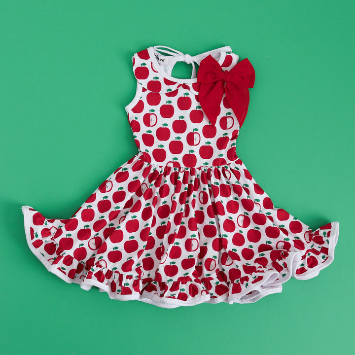 girls apple print dress outfit with matching red linen hair bow