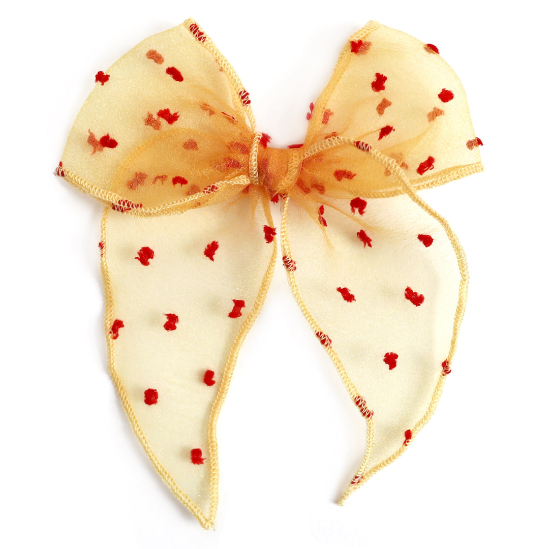 sheer yellow hair bow with fuzzy red polka dots