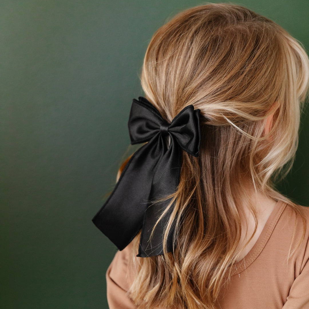 girls large black satin bow on clip