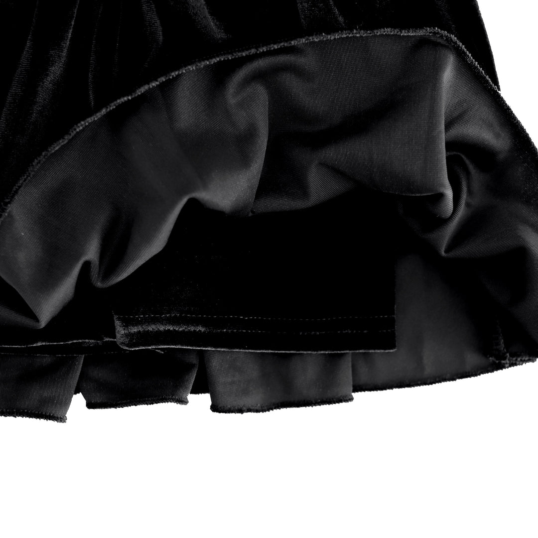 detail photo of built in black stretchy velvet shorts attached to velvet skort for Halloween