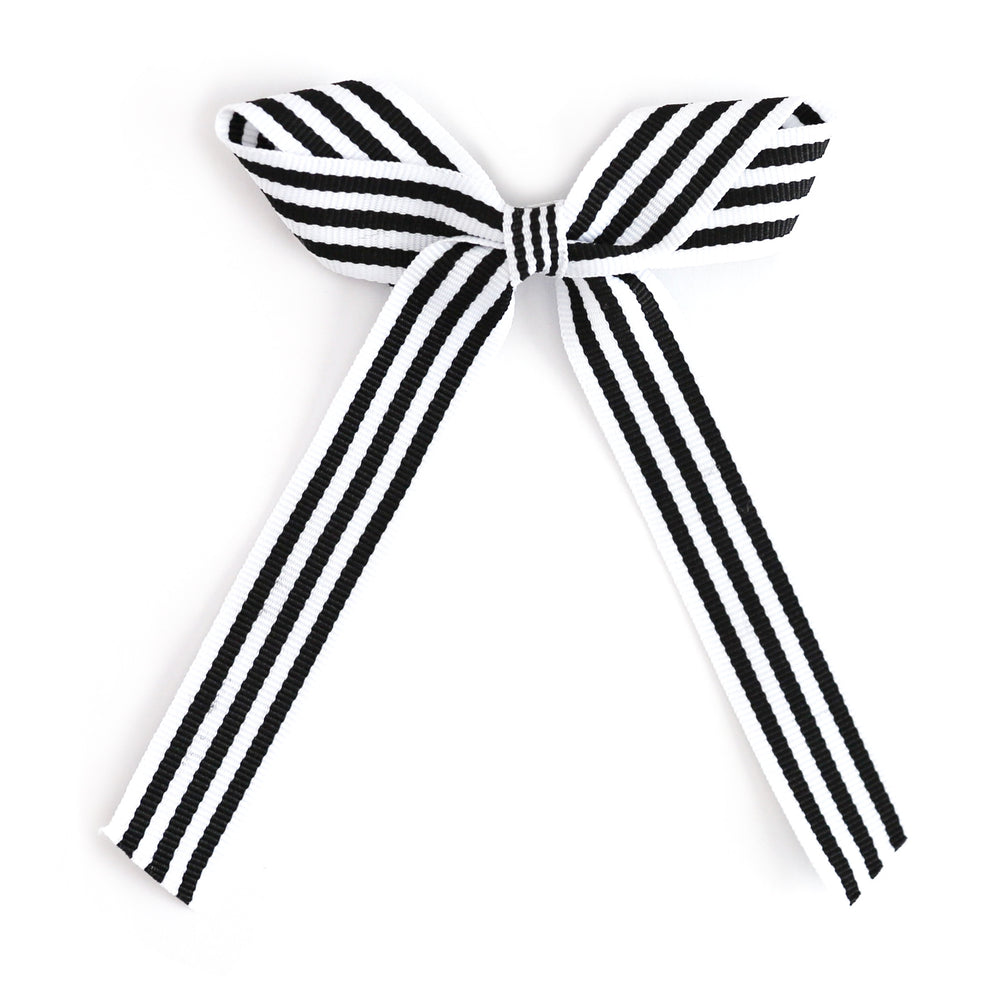 girl's black and white striped ribbon bow on alligator clip for Halloween