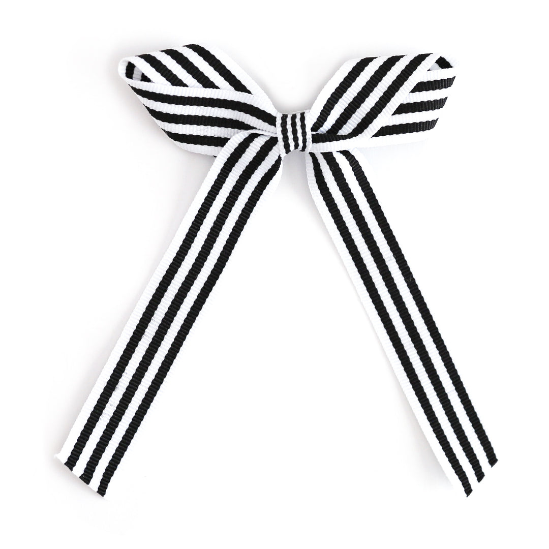 girl's black and white striped ribbon bow on alligator clip for Halloween