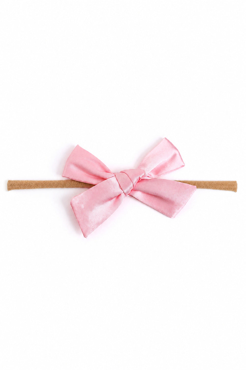 light pink satin hair bow on nylon band for baby girl