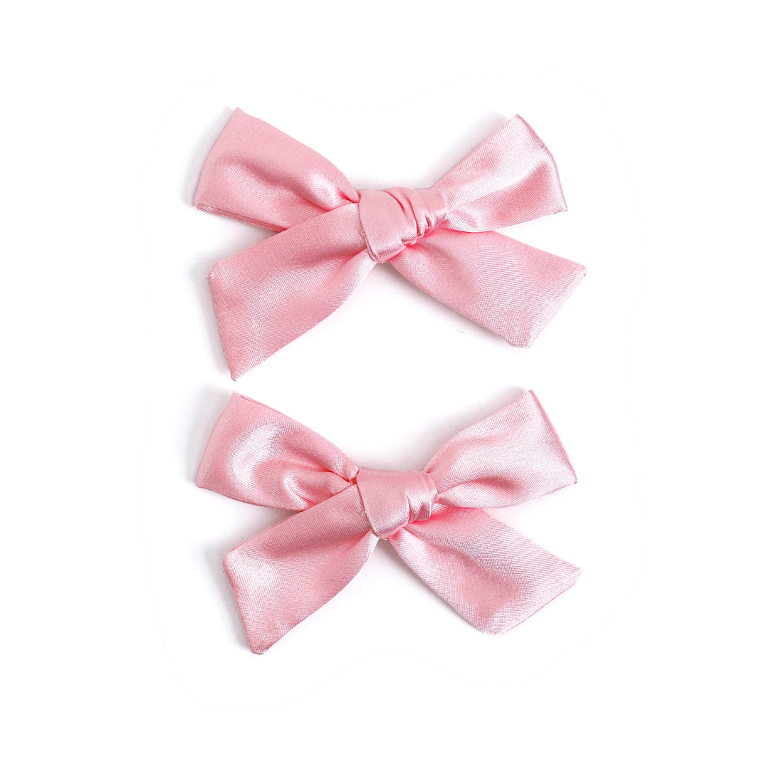 little girls light pink satin hair bows for pastel Christmas outfits