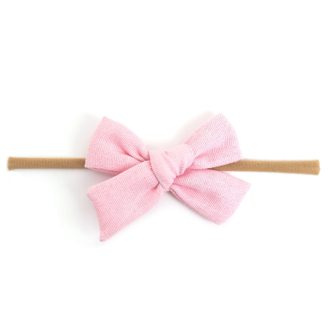 light blossom pink linen baby bow on nylon headband