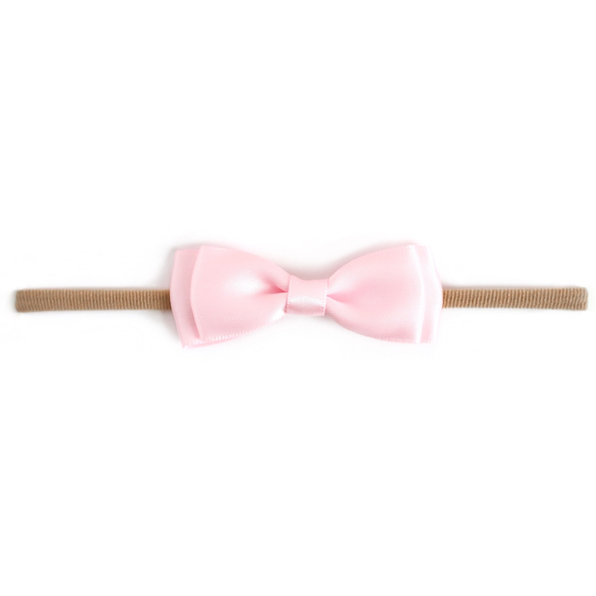 baby girls light pink satin bow on stretchy nylon headband