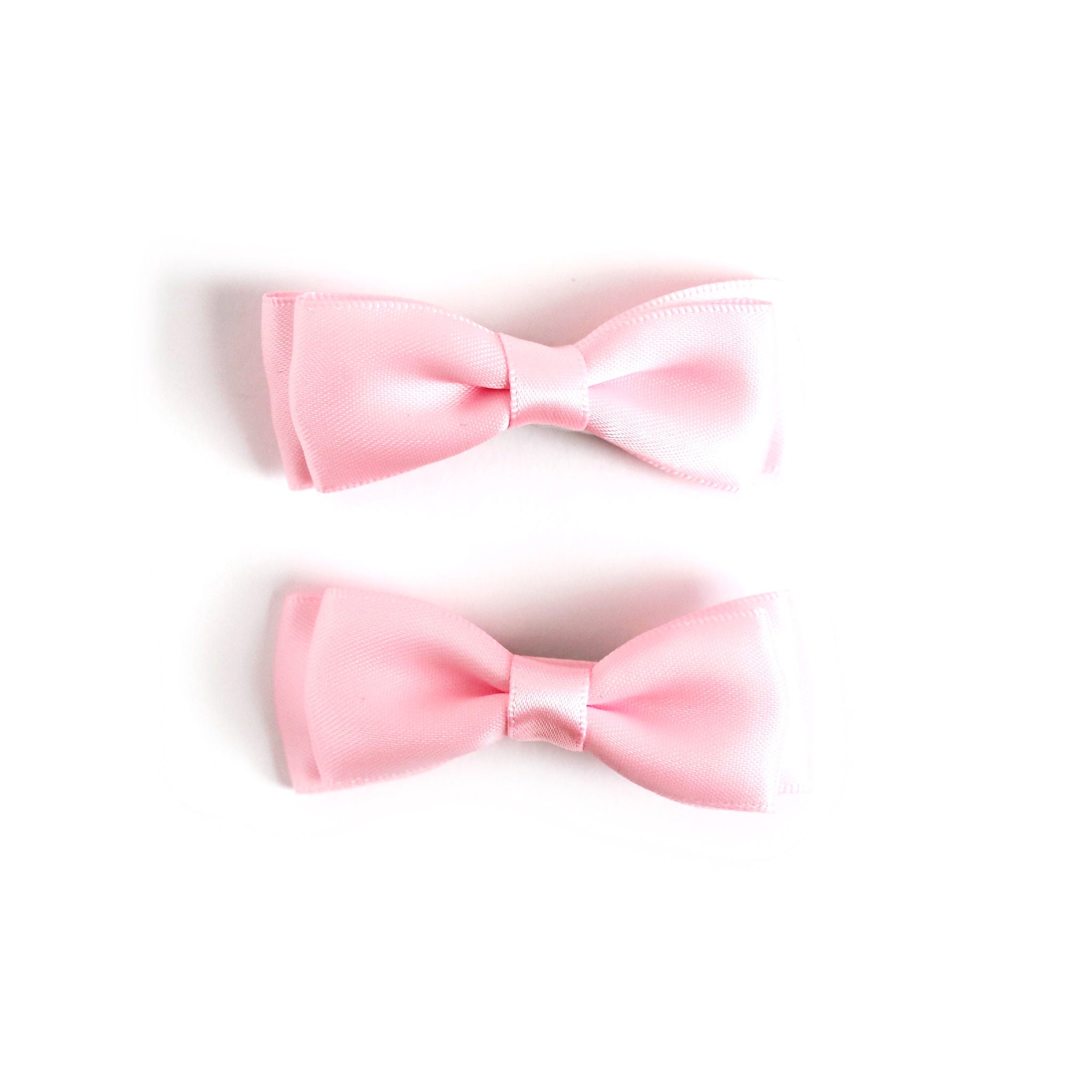 light pink satin pigtail bows on clips