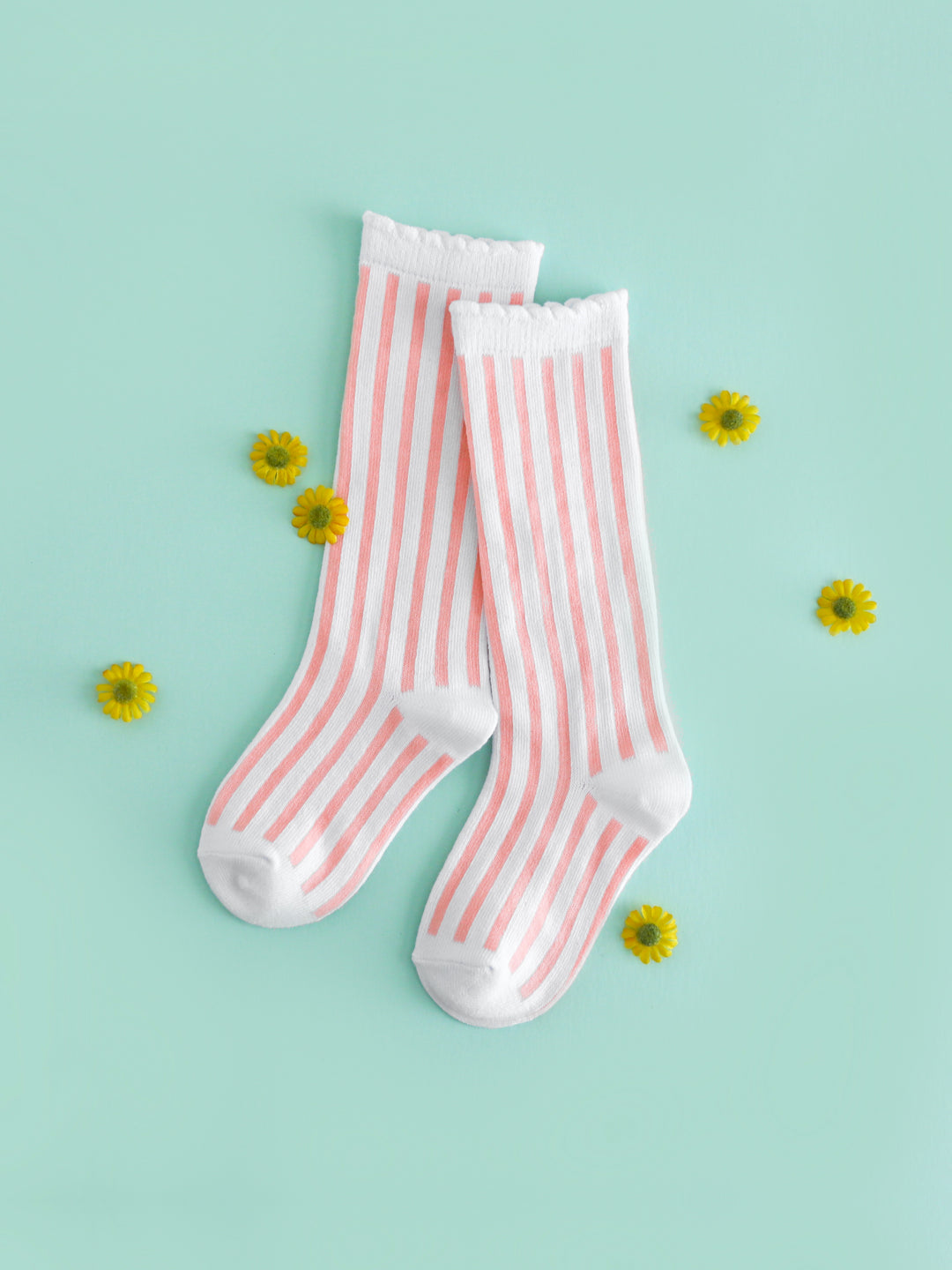 girls' white and light pink vertical striped knee high socks with white scalloped trim to match spring and Easter outfits
