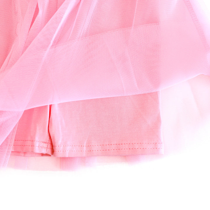 closeup of pink biker shorts attached to tutu skirt