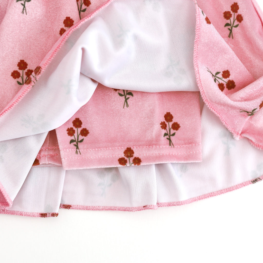closeup of attached velvet shorts for girls' light pink fall floral velvet skort 