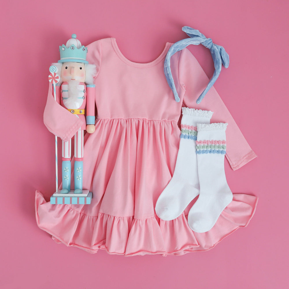 girls light pink twirl dress with matching accessories for christmas