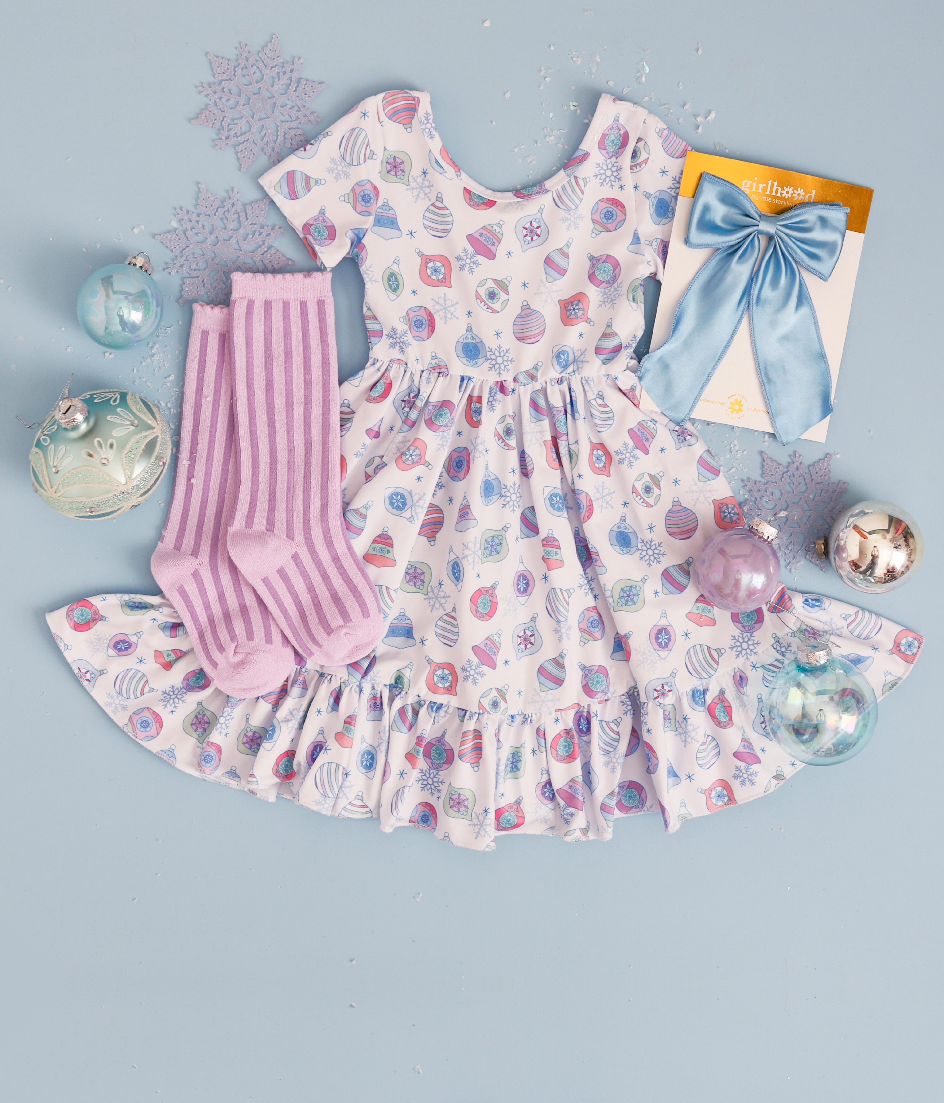 girls pastel ornament twirl dress with blue satin bow and pastel striped lace top knee highs