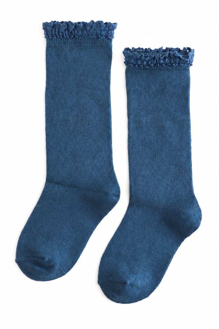 pair of medium blue fall knee high socks with lace trim for girls