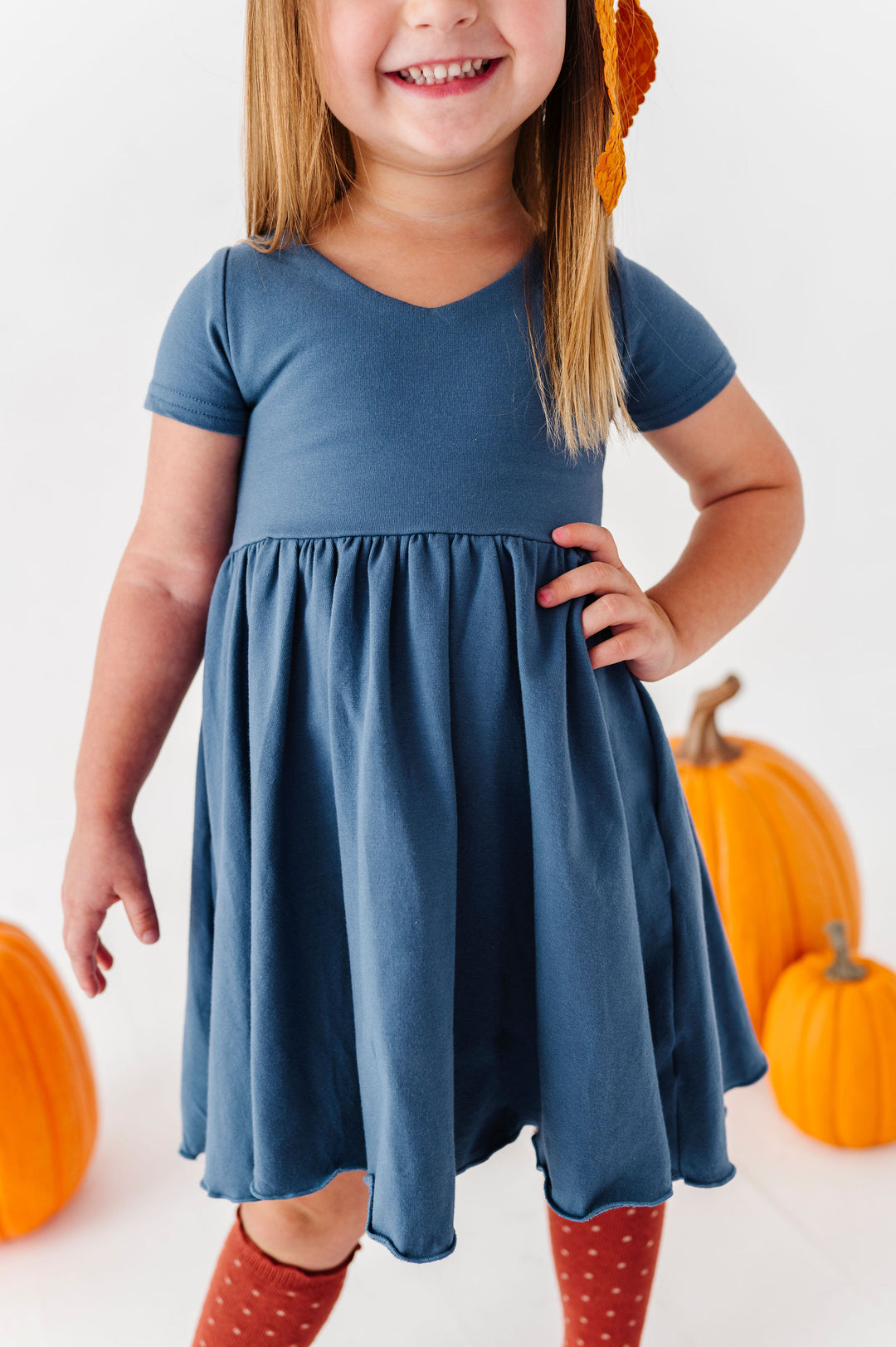 detail photo of blue v neck dress for girls