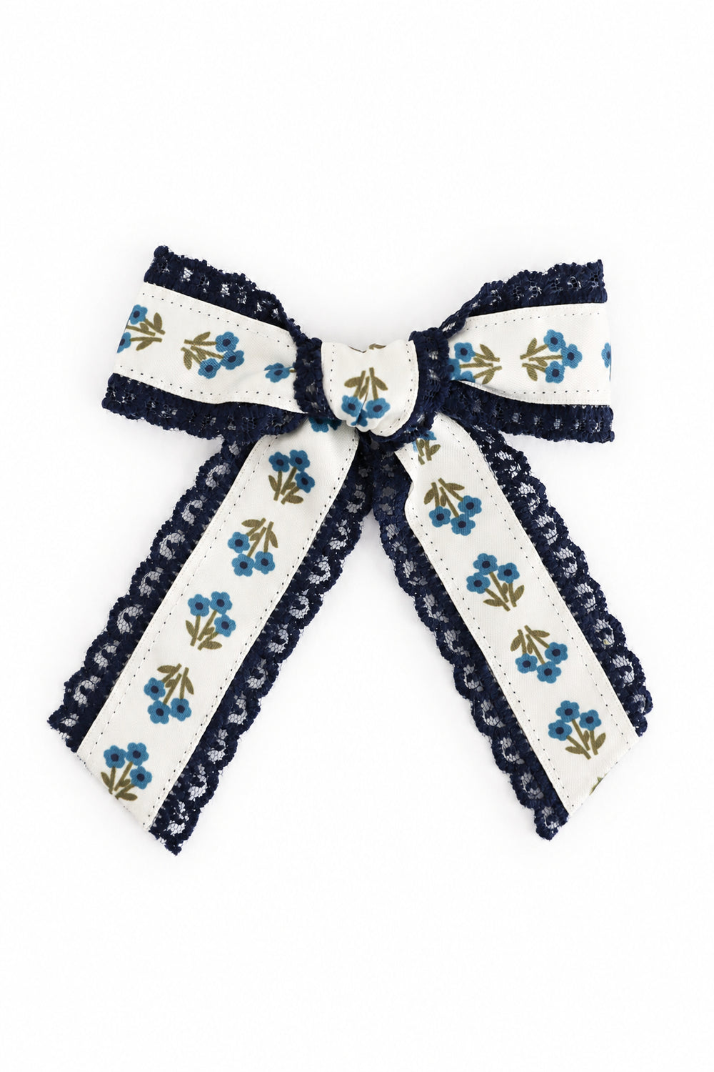 girls' blue floral hair bow with navy lace trim on alligator clip