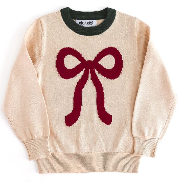 girls cream Christmas sweater with forest green trim at the neckline and large crimson ribbon design 