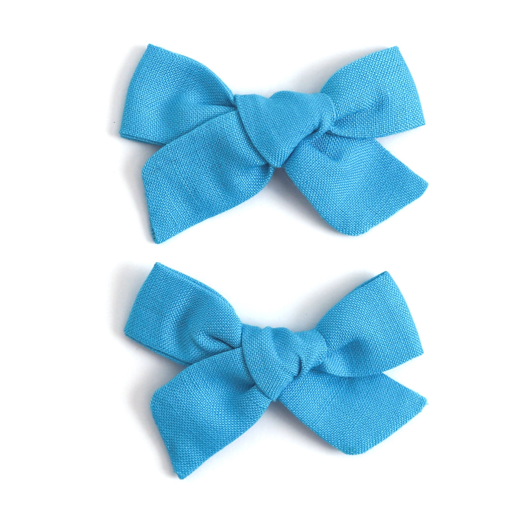 bright aqua blue linen pigtail bows 